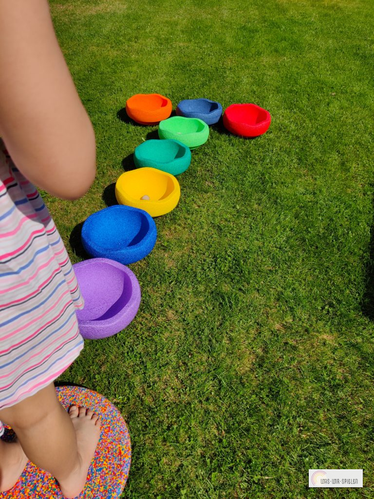 Zielwerfen mit Stapelsteinen