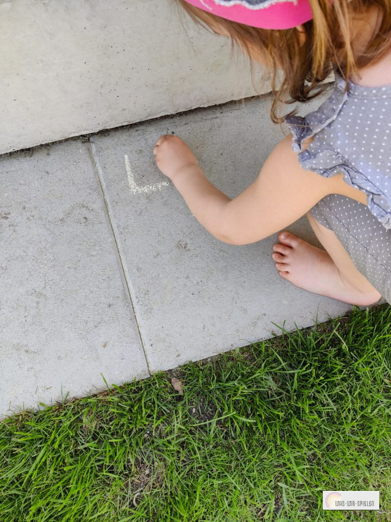 Straßenkreide um Punkte zu notieren