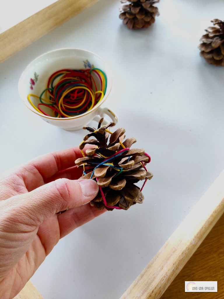 Zapfen mit Gummiringen umspannen