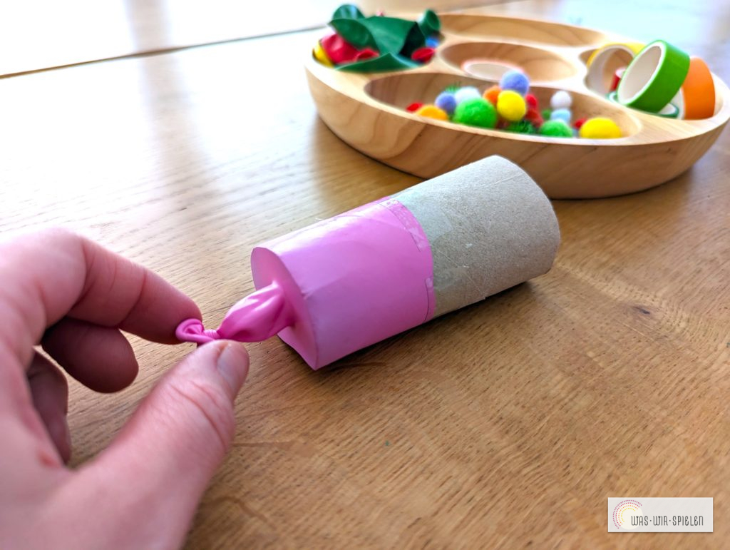 Mit Klebeband fixieren