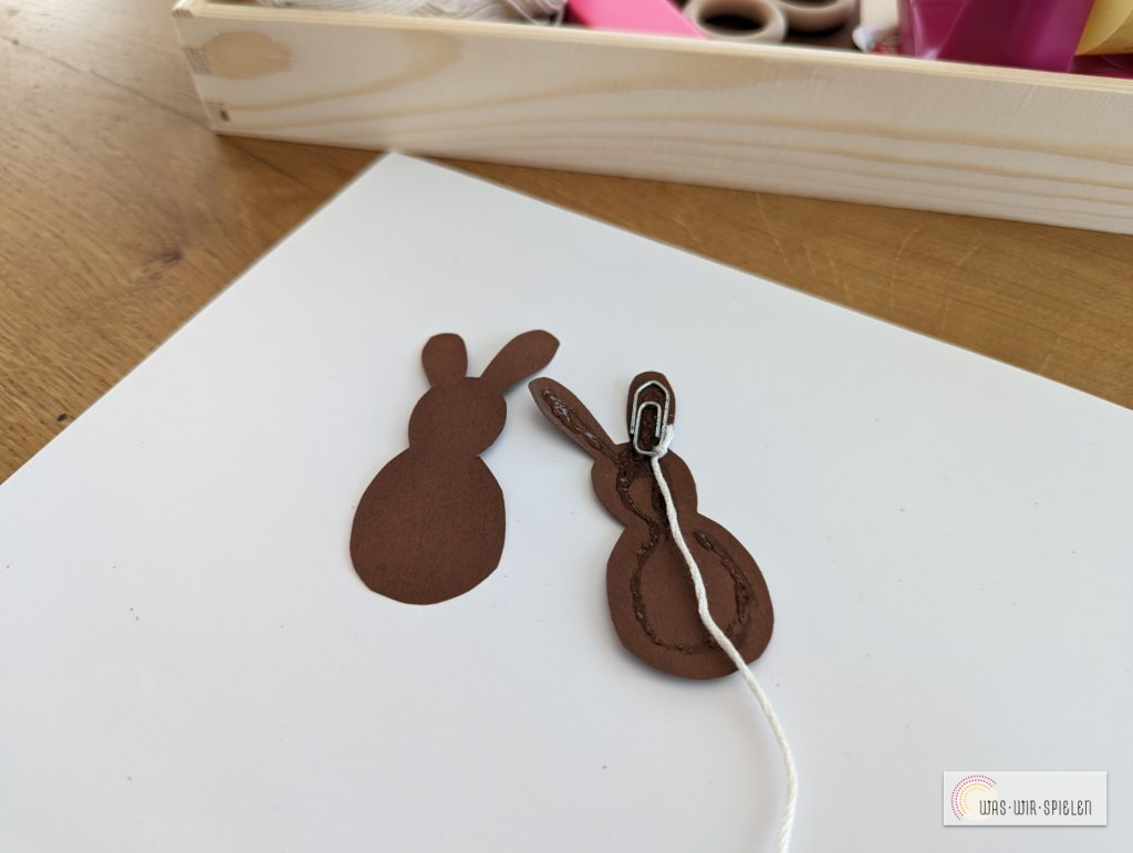 Büroklammer ankleben