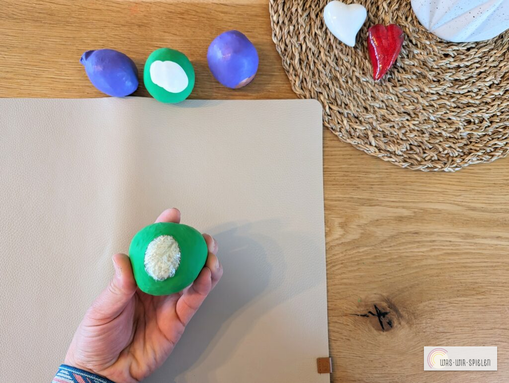 Luftballon eins über den Reis stülpen