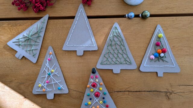 Weihnachtliche Fadenbäume – einfache Stickidee für Kinder